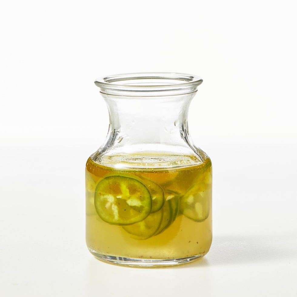 jalapeno and lime vinaigrette in a glass bottle