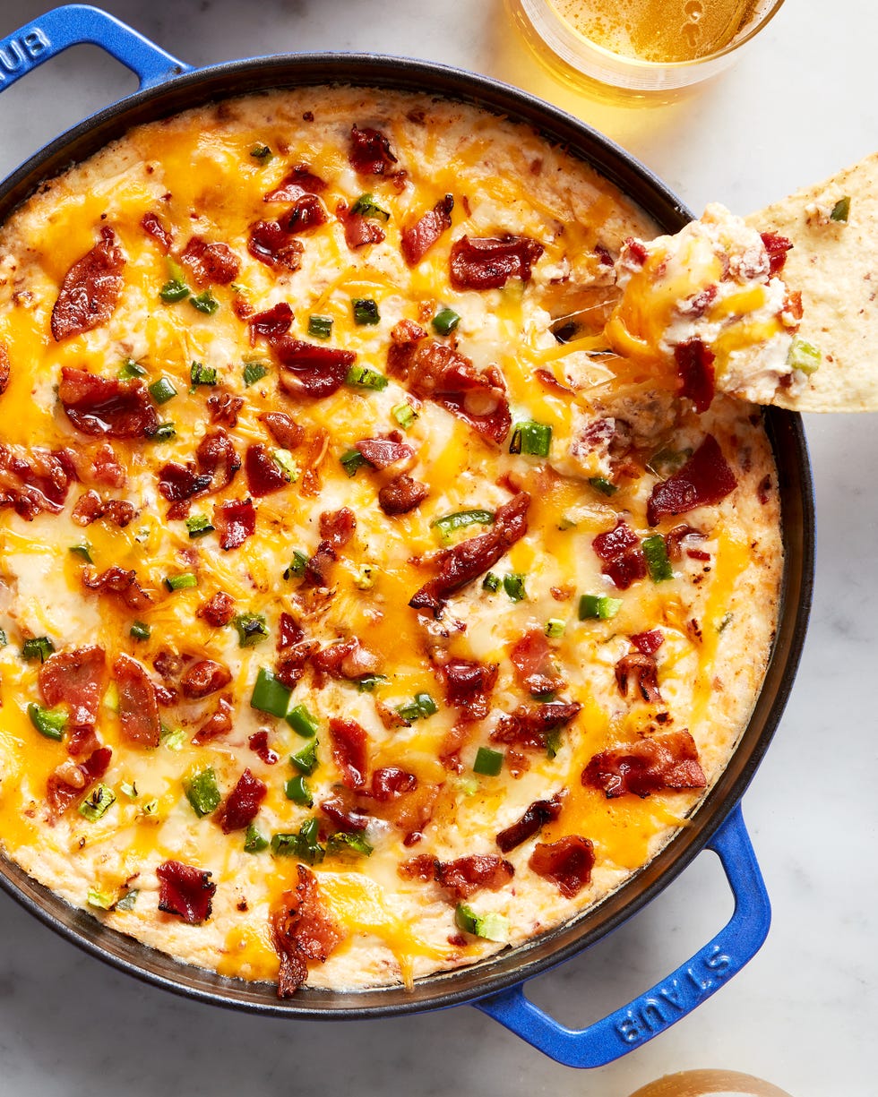 creamy cheese dip topped with bacon and diced jalapeno