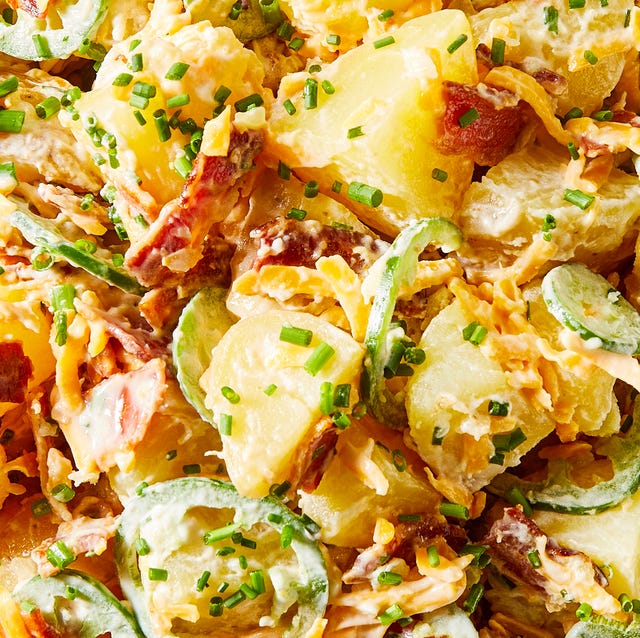 Jalapeño Popper Potato Salad potato salad in a bowl with sliced jalapenos, bacon, and cheese