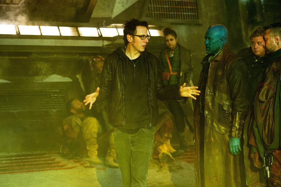 GUARDIANS OF THE GALAXY, from left: director James Gunn, Michael Rooker, Sean Gunn, on set, 2014.
