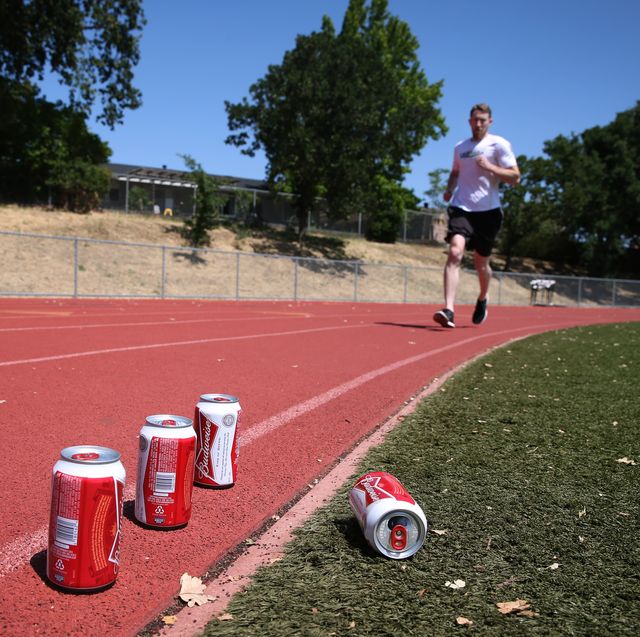 james nielsen trains for a beer mile run in novato, calif. on saturday, may 9, 2015. nielsen broke the sub 5 minute barrier in the acclaimed beer mile running event after he was timed chugging four beers and running one mile in 4:57. nielsen is organizing