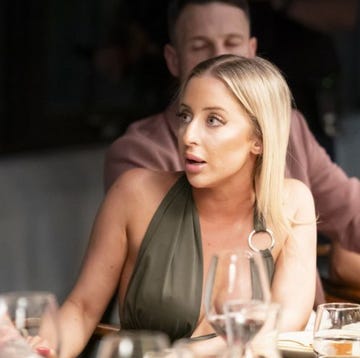 Married at first sight couples who talk group gathering at a dinner table with various individuals and glassware