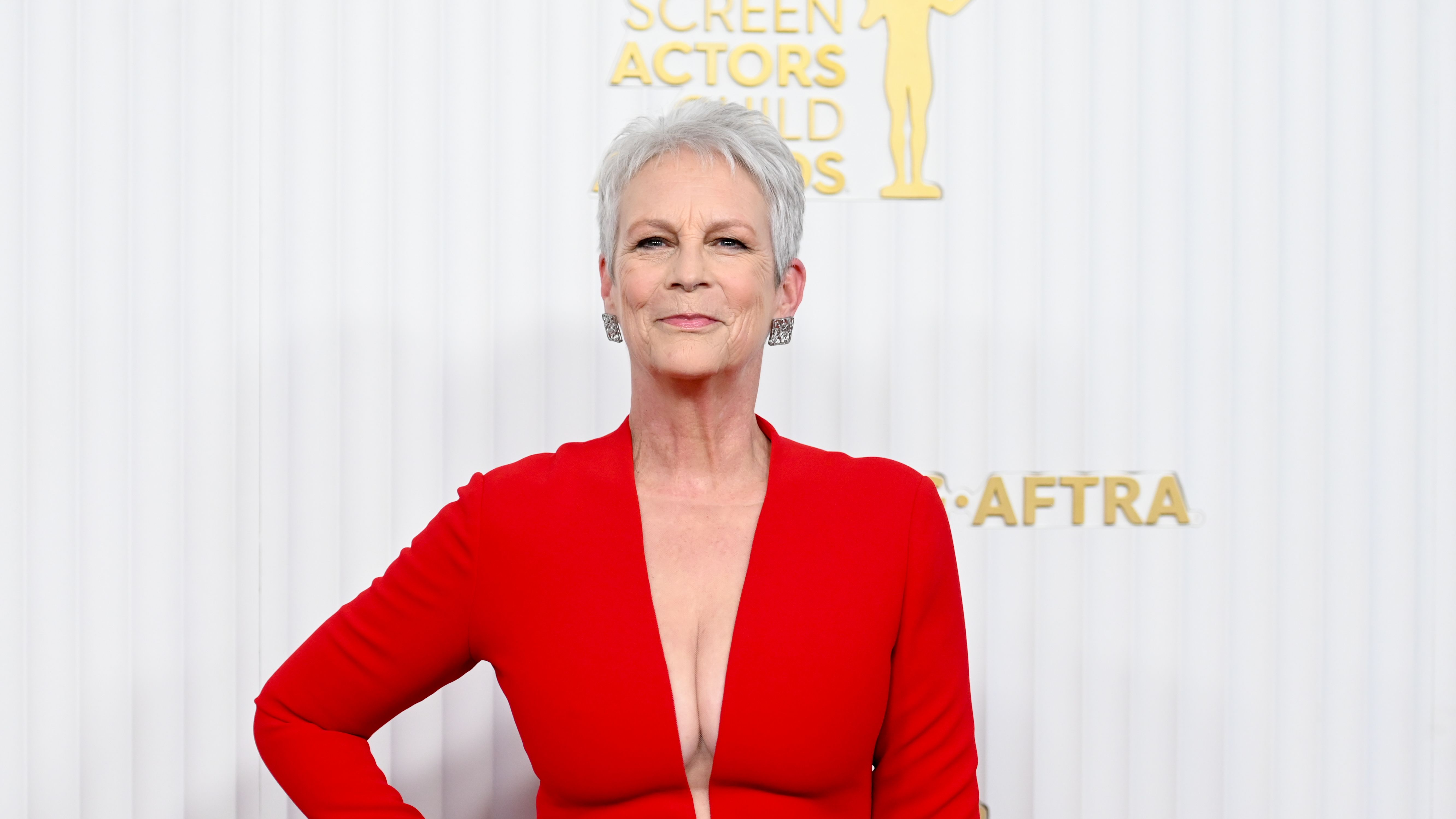 Jamie Lee Curtis, 64, Stuns in a Plunging Red Gown at SAG Awards