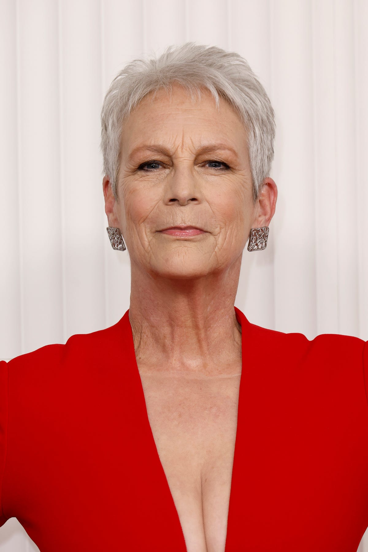 Jamie Lee Curtis, 64, Stuns In Cheeky Throwback Pic: ‘Curves Ahead’