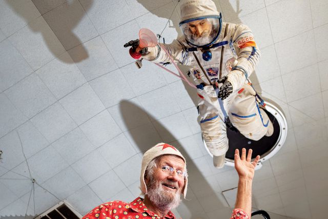 jamis macniven, cofounder of buck’s of woodside, with his russian space suit hanging from the restaurant’s ceiling