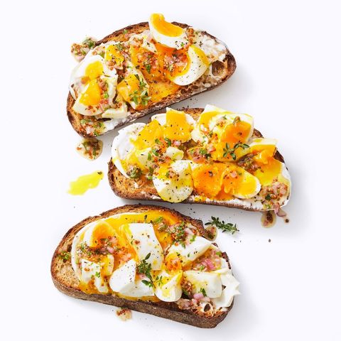 jammy egg toasts on a white background