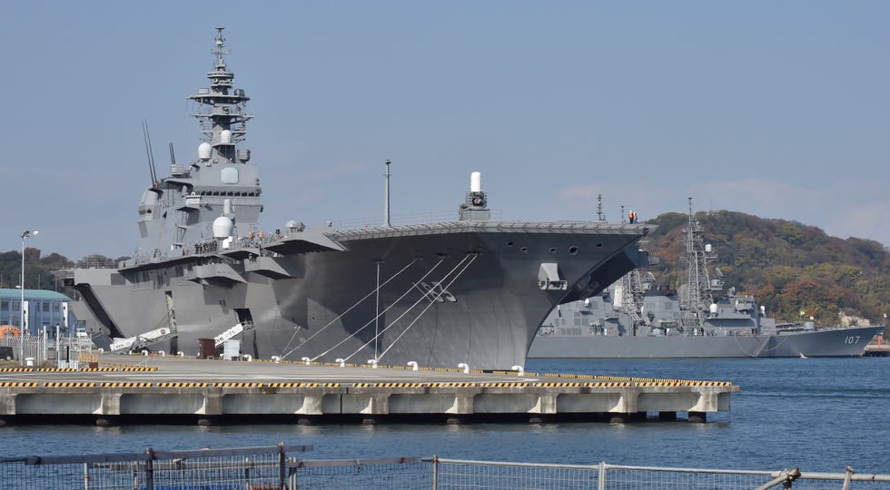 japanese aircraft carrier izumo docked in port