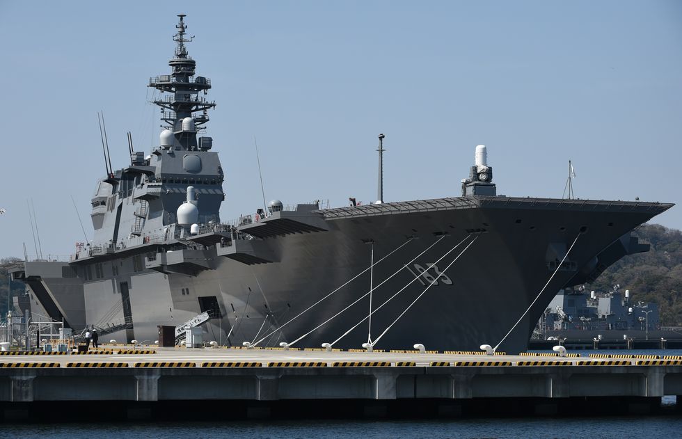japan maritime self defense forces carrier izumo anchored up at its yokosuka base in kanagawa