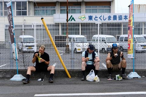 Cyclists eating convenience store food in Japan in the summer of 2018.
