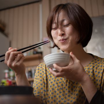 japanese woman eating rice