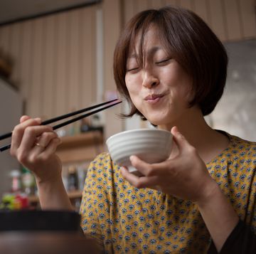 japanese woman eating rice