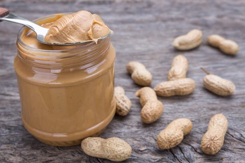 Jar of peanut butter with nuts. Jar of peanut butter with nuts.