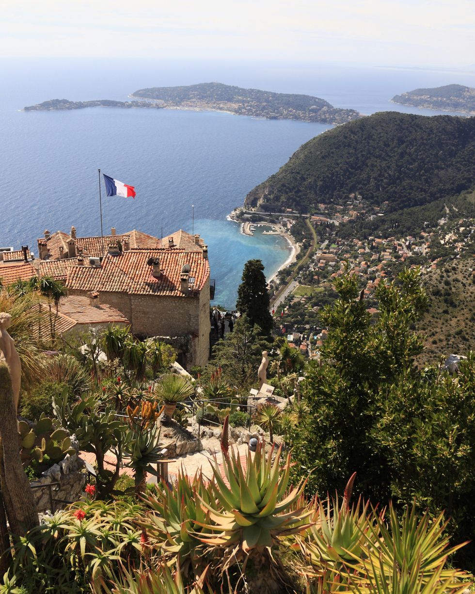 view from botanical garden at eze cote d'azur between nice and monaco france over hotel chateau eza, eze port and cap ferrat