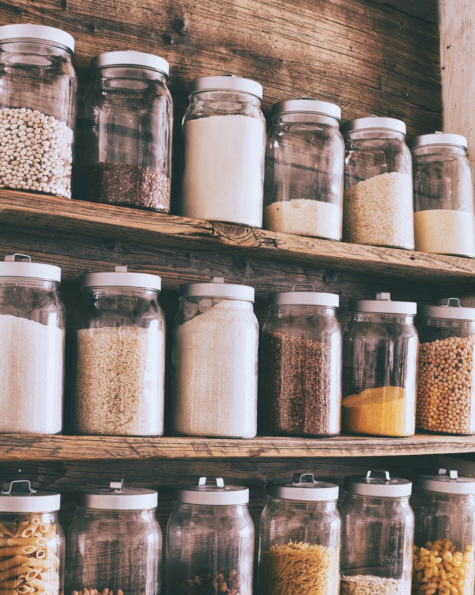 jars of ingredients on wooden shelves
