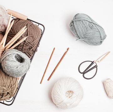 crochet supplies, with crochet hook and yarn