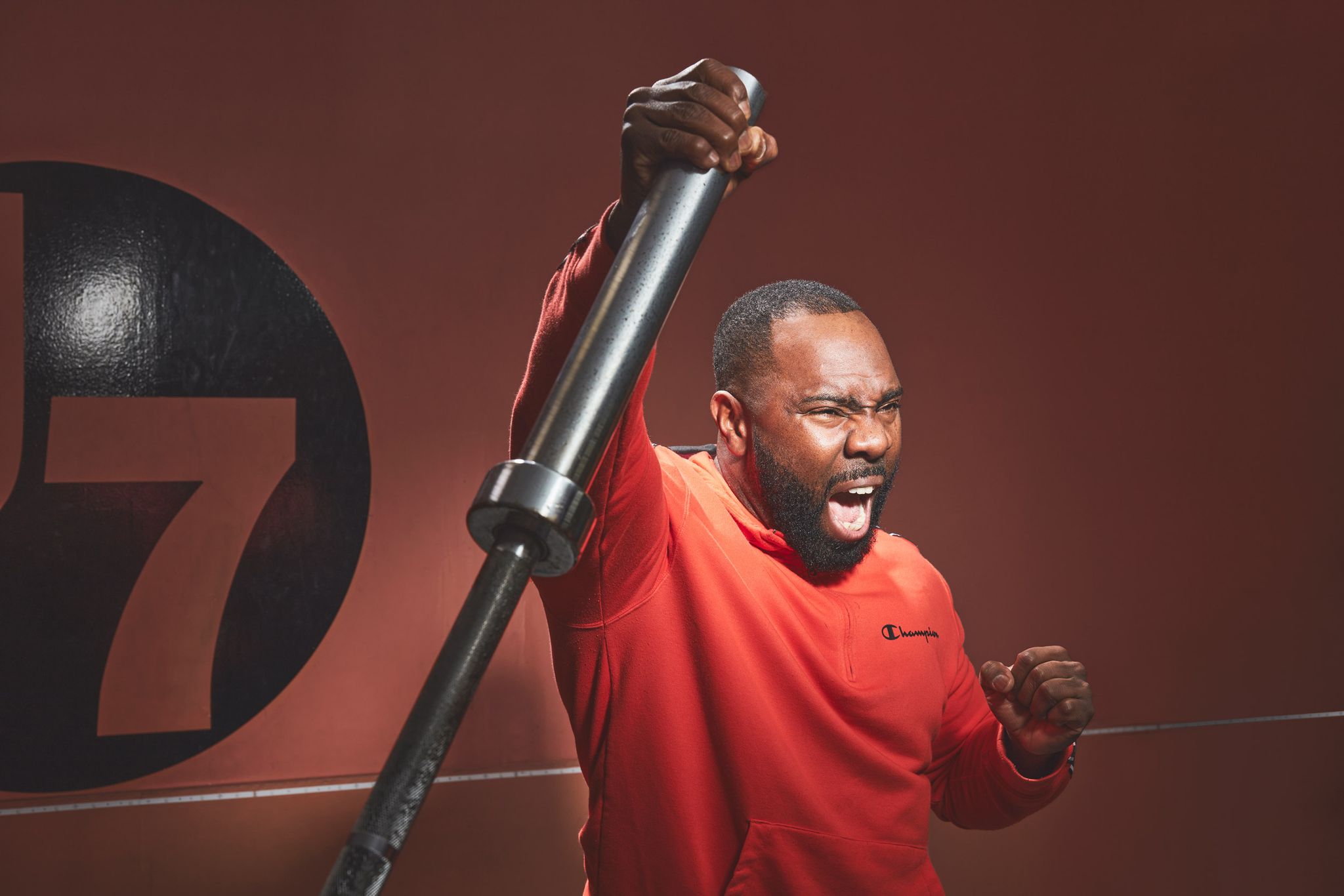 a man holding a barbell