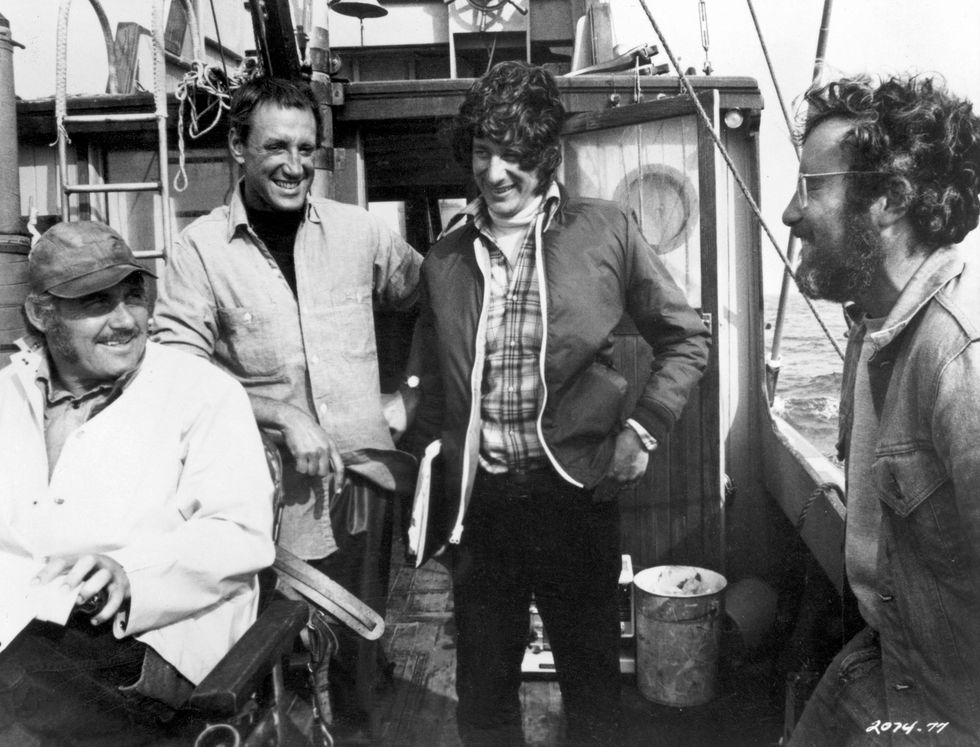 1975, british actor robert shaw, american actor roy scheider, american director steven spielberg, and american actor richard dreyfuss laugh together on a boat during the filming of spielberg's 'jaws' photo by universal studiosgetty images