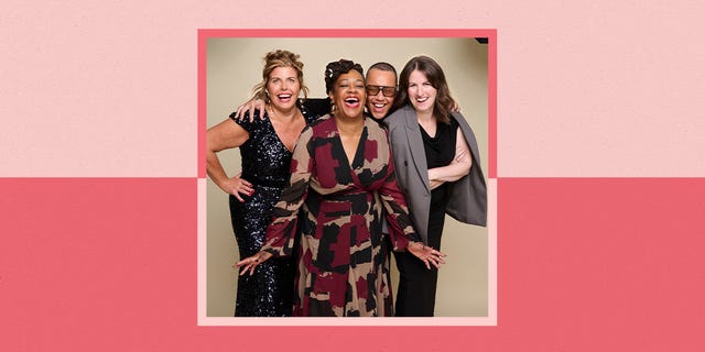 group of four women in various stylish outfits posing together