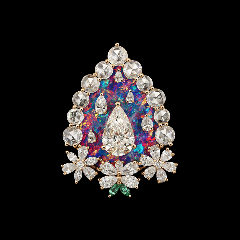 a dazzling jewelry piece featuring a vibrant opal centerpiece surrounded by various diamonds