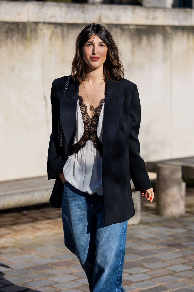 woman wearing a blazer and jeans