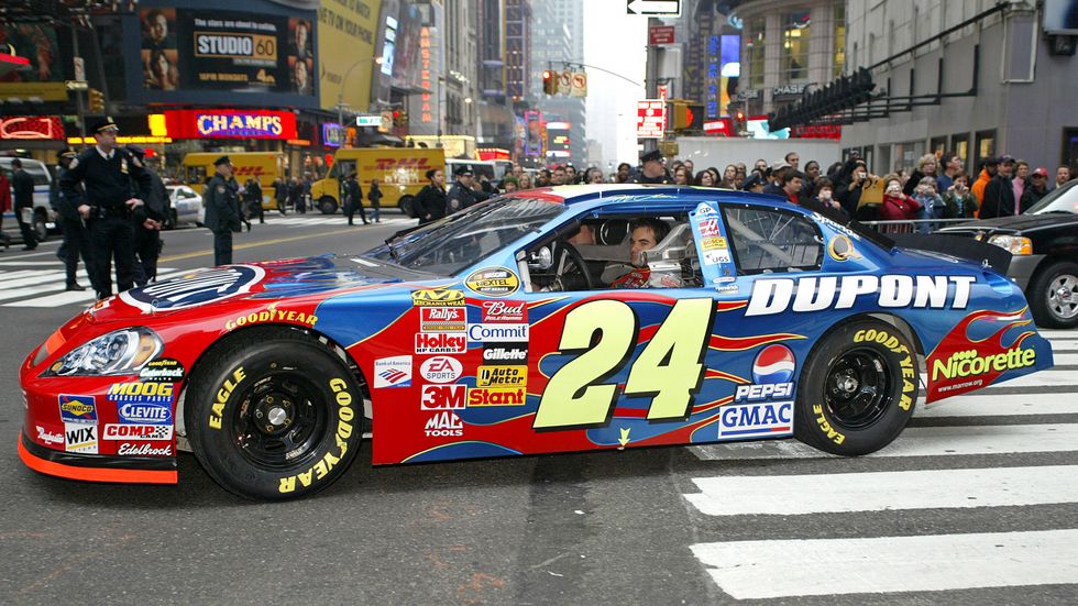 nascar drivers participate in a 10 car victory lap procession around midtown to celebrate 2006 nascar nextel cup season