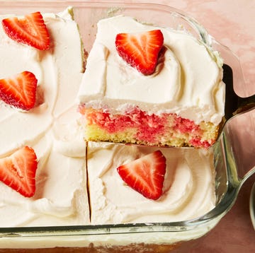 Jell-O Cake jello cake topped with frosting and strawberry slices
