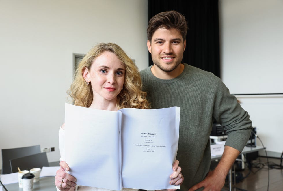 actors holding a script for a production titled hope street