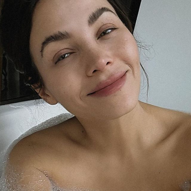 a woman in a bathtub
