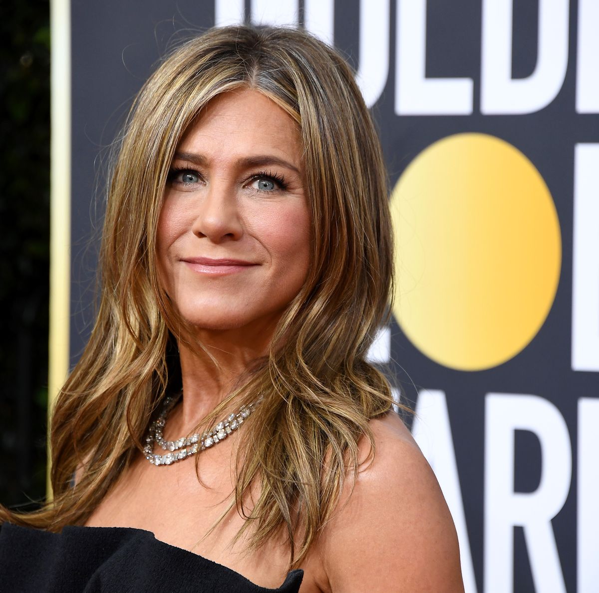 How Jennifer Aniston Wears Ankle Boots During Summer