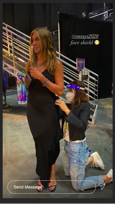 jennifer aniston being styled backstage at the emmys 2020
