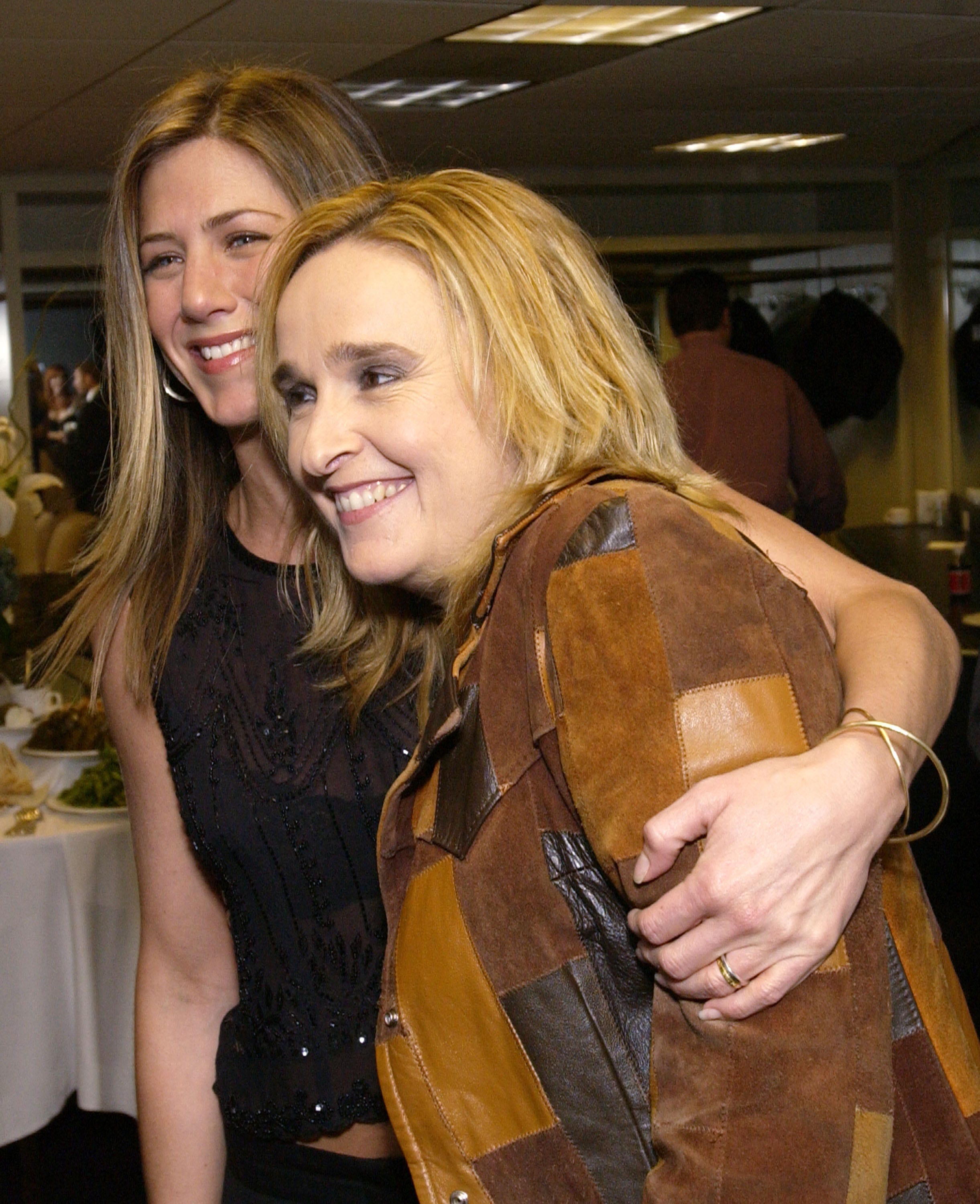 jennifer aniston and melissa etheridge smile and pose for photos