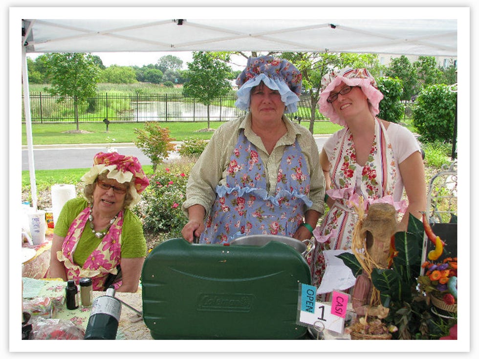 jennifer billock and family dressed in floral outfits at an outdoor table