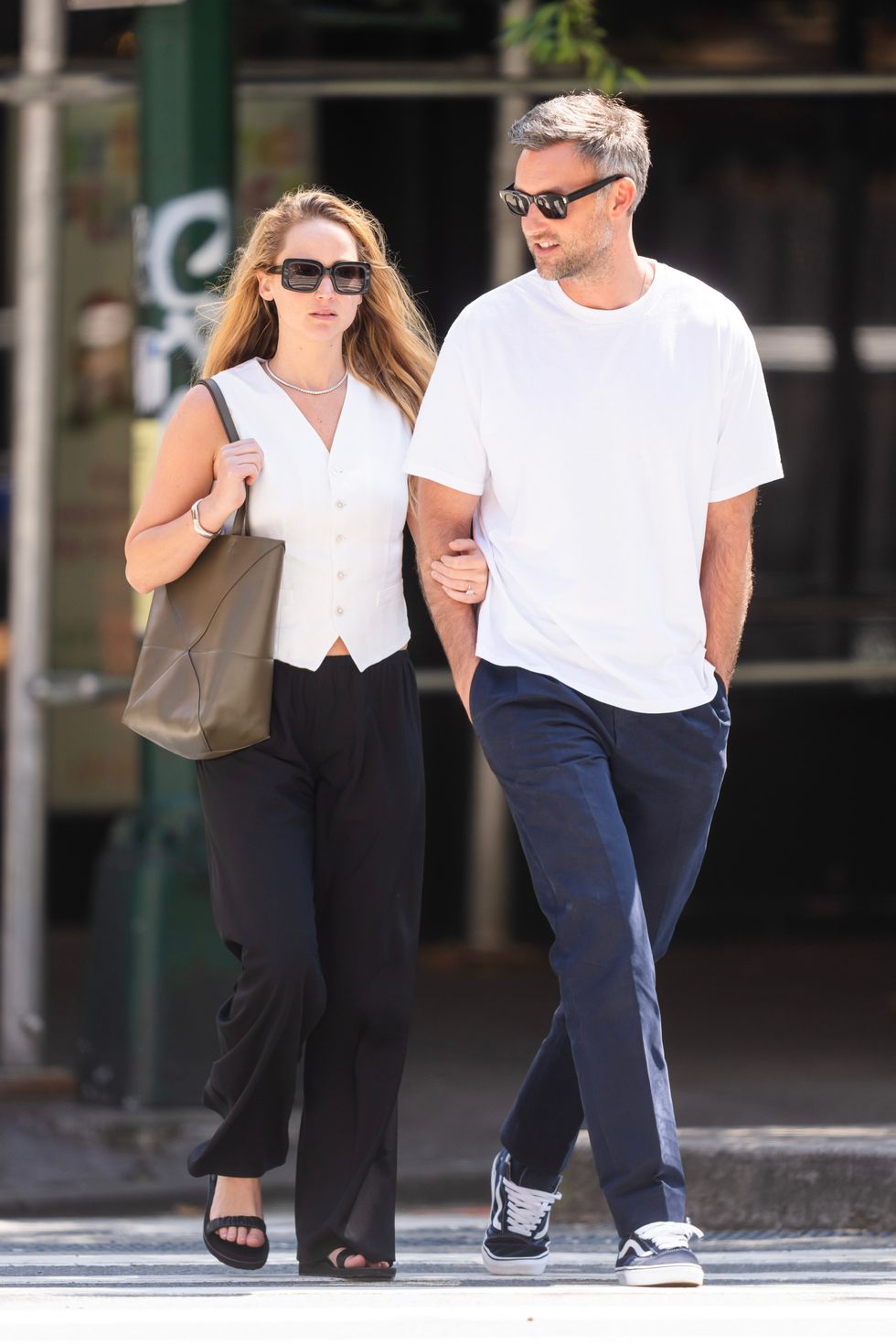 Jennifer Lawrence Wore a White Tee With a Leather Tote