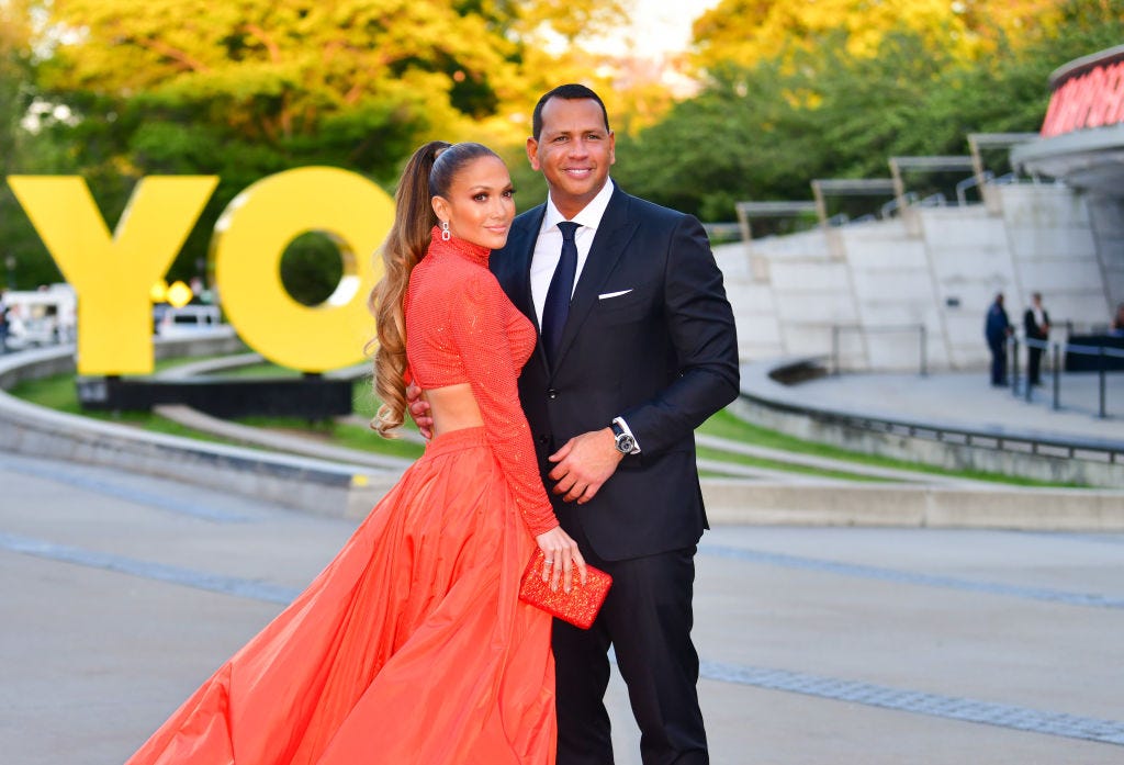 Alex Rodriguez Kisses Jennifer Lopez At Her 50th Birthday Party