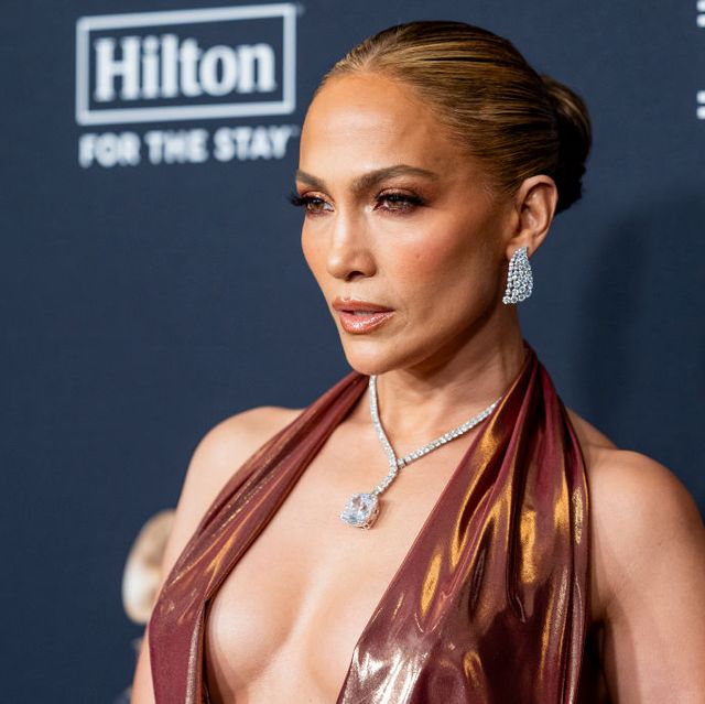 Jennifer Lopez Wears Plunging Iridescent Red Gown to Pre-Grammys Gala