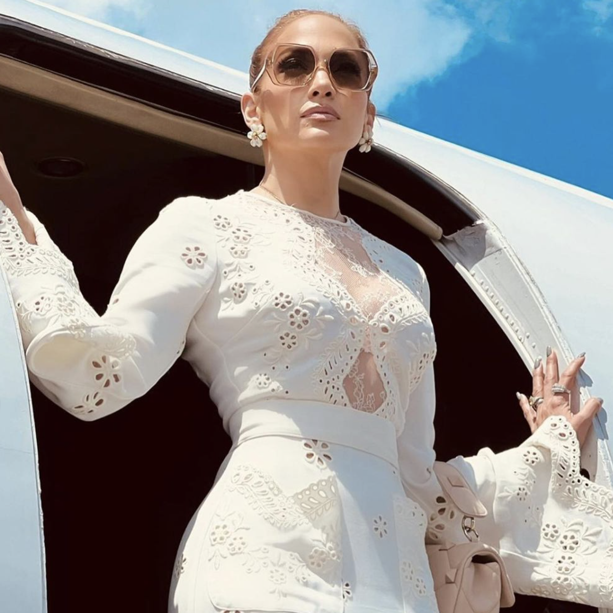 Jennifer Lopez wears the perfect lacy white dress for summer