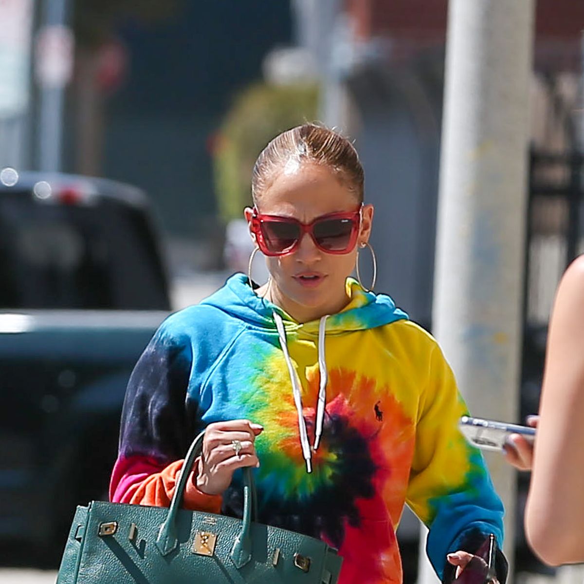 Jennifer Lopez Bursts in Colorful Tie-Dye Hoodie, Neon Leggings