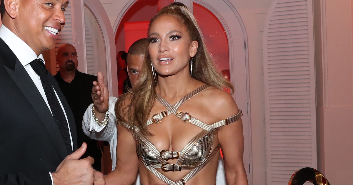 Jennifer Lopez wears sexy gold dress for 50th birthday