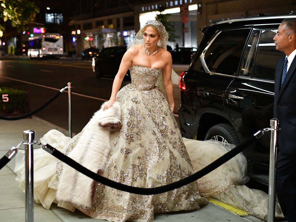Jennifer Lopez Spotted In Wedding Dress Showing Off Toned Arms