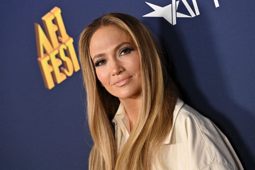 JLo wears nearly-naked little black dress with statement bow