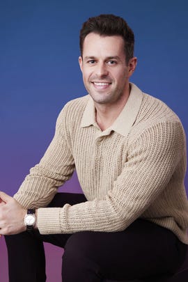 a man with his arms crossed