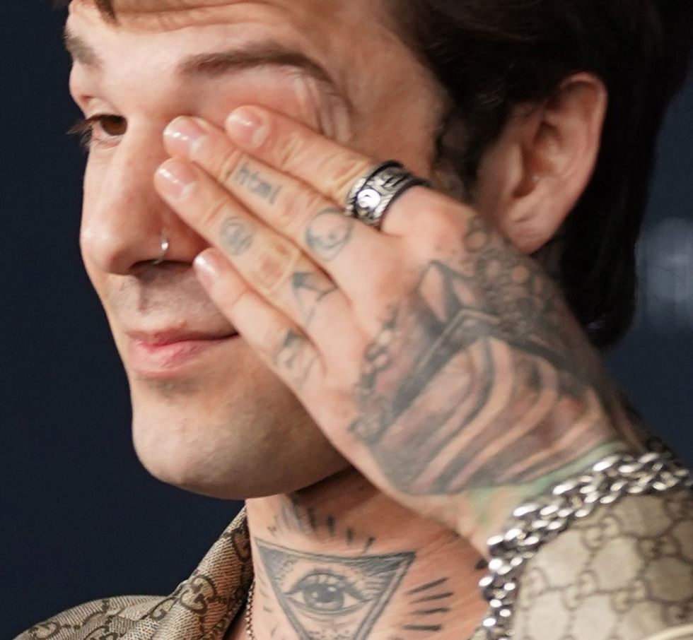 jesse rutherford's love tattoo on his hand