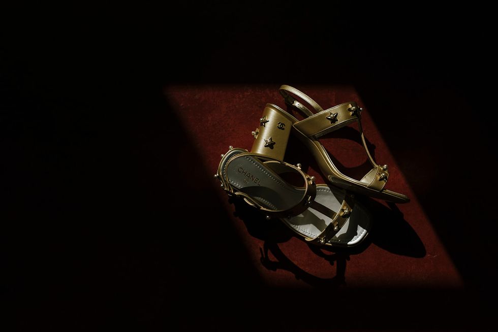 Footwear, Still life photography, Shoe, Darkness, Photography, Space, Fashion accessory, Sandal, 