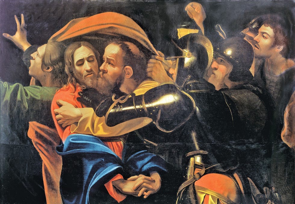 Judas kust Jezus in Caravaggios De gevangenneming van Christus dat circa 1602 werd geschilderd
