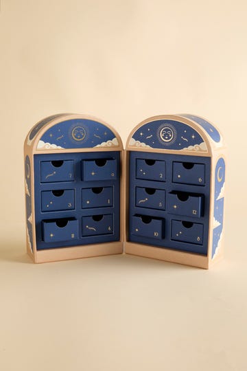 decorative advent calendar with drawers featuring celestial themes