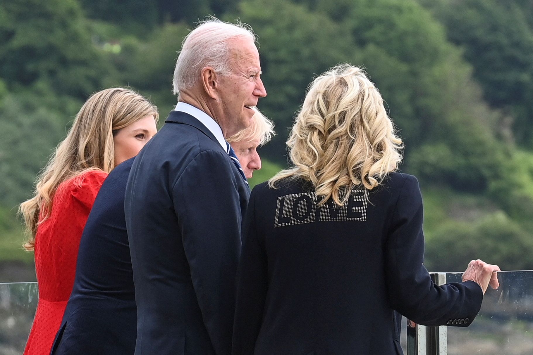britains prime minister boris johnson 2r, his wife carrie johnson l and us president joe biden and us first lady jill biden, wearing a jacket bearing the words love, look out over the sea, prior to a bi lateral meeting at carbis bay, cornwall on june 10, 2021, ahead of the three day g7 summit being held from 11 13 june   g7 leaders from canada, france, germany, italy, japan, the uk and the united states meet this weekend for the first time in nearly two years, for the three day talks in carbis bay, cornwall   photo by toby melville  pool  afp photo by toby melvillepoolafp via getty images