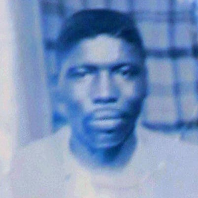 Cordelia Billingsley, daughter of Jimmie Lee Jackson, holds a photo of her slain father Jimmie Lee Jackson at the Perry County Courthouse in Marion, Ala., Monday, Nov. 15, 2010. Former Alabama State Trooper James Bonard Fowler entered a plea of misdemeanor second-degree manslaughter two weeks before he was scheduled to go to trial on a murder charge for the death of Jackson. (AP Photo/Phillip Rawls)