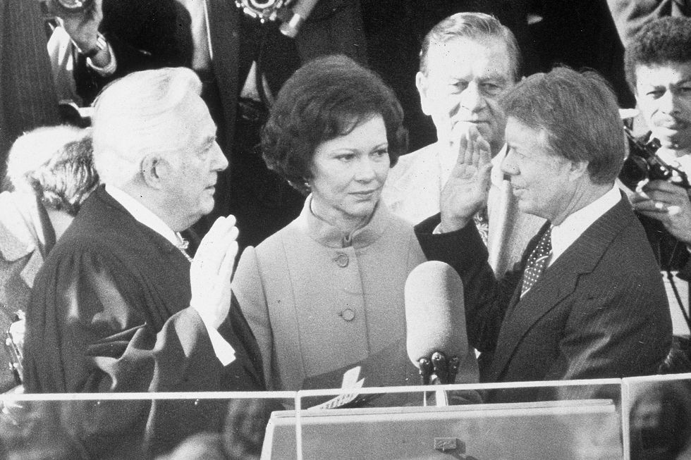 jimmy carter is sworn in by chief justice earl burger as the 39th president of the united states on january 20, 1977, in washington dc