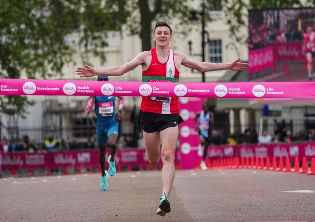 ellis cross of aldershot farnham  district ac celebrates as he crosses the finish line to win the elite men’s race ahead of sir mo farah the vitality london 10,000, monday 02 may 2022

photo jed leicester for the vitality london 10,000

for further information medialondonmarathoneventscouk