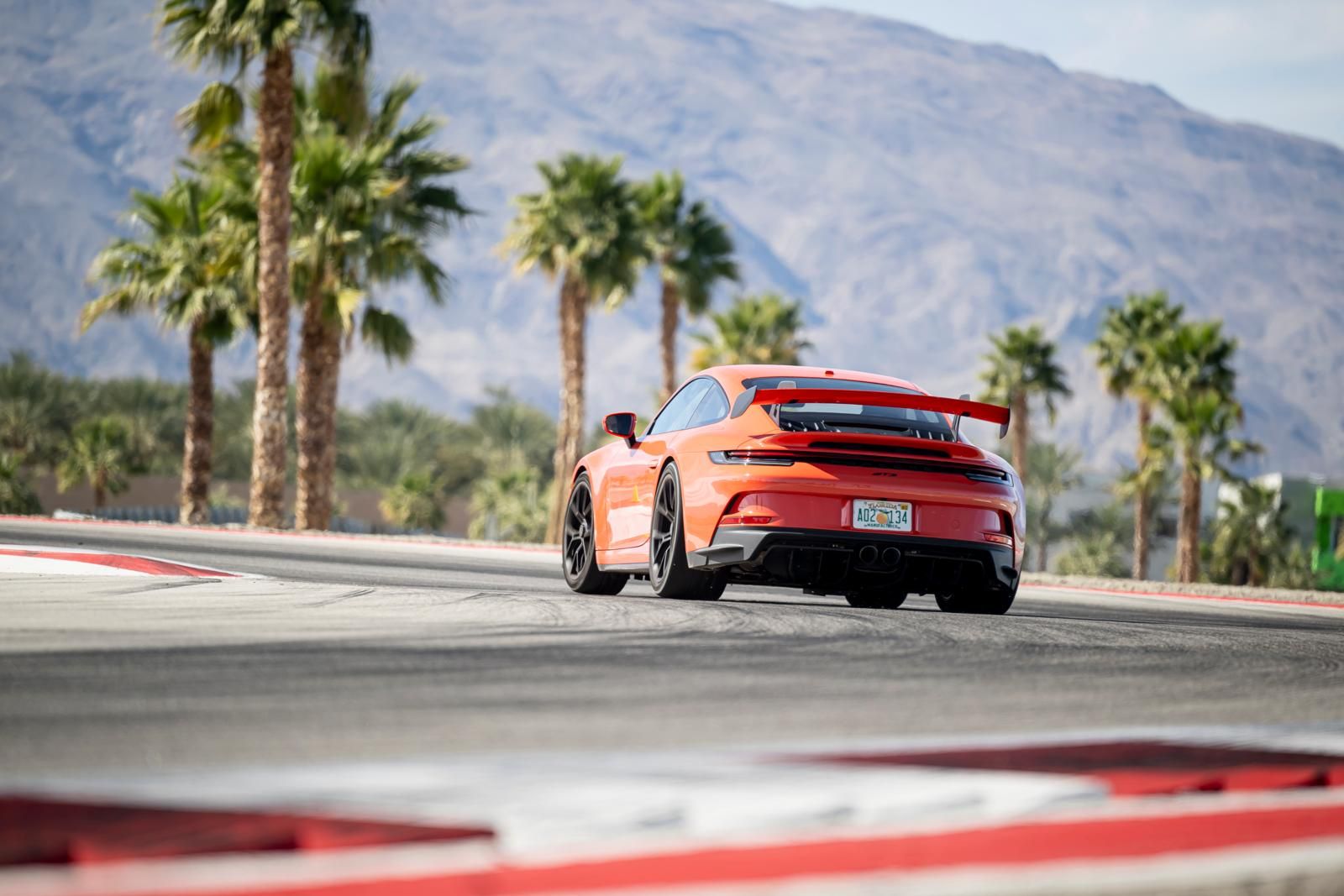 porsche 911 gt3 on the track at thermal club